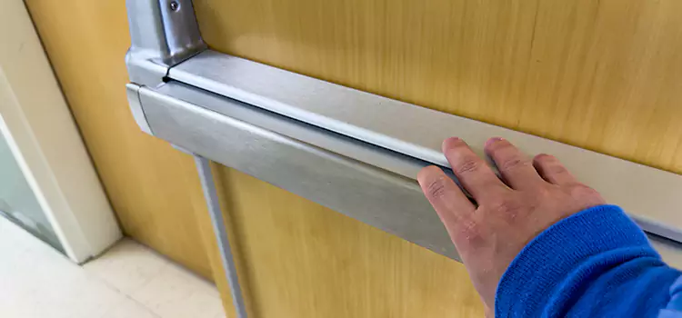 Installing a Push Bar on a Door Port Hueneme